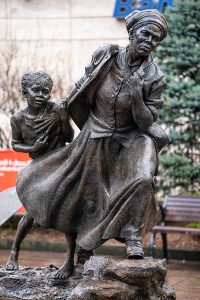 The Journey to Freedom. Harriet Tubman leading a young enslaved girl to freedom.